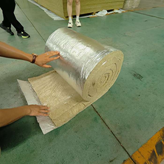 unrolling foil-backed insulation